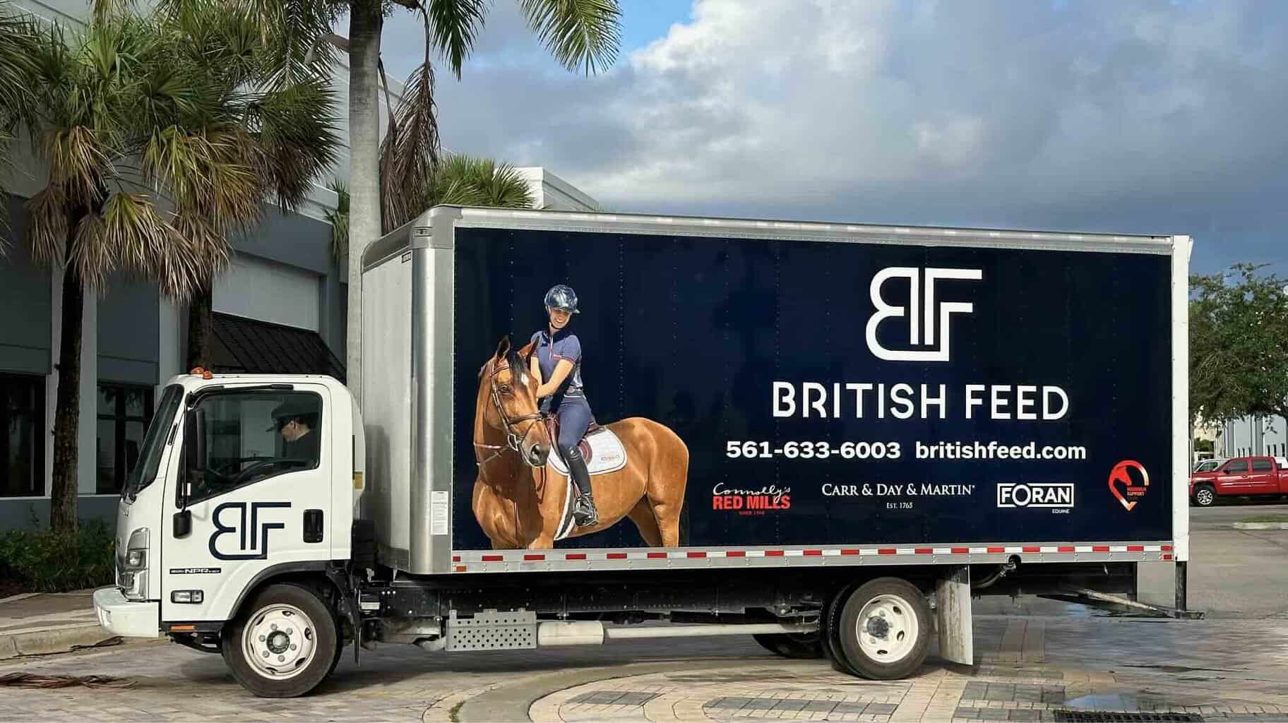 British Feed delivery truck with horse graphic and company logo.