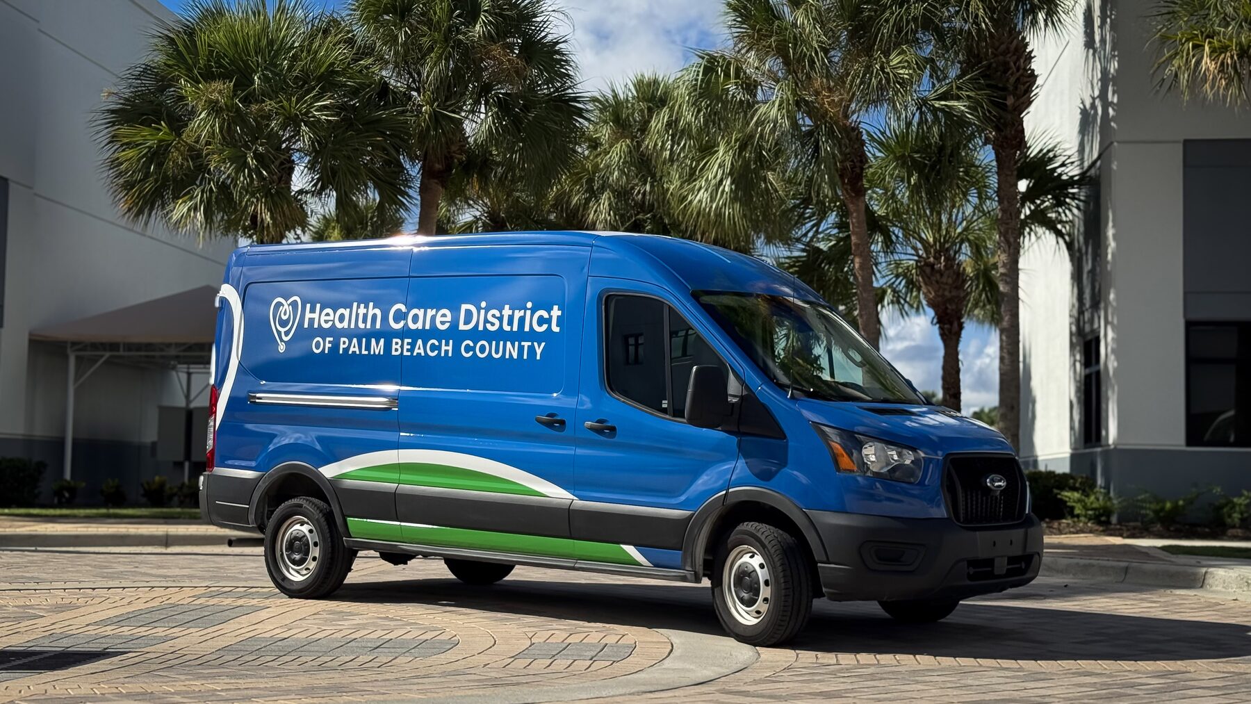 Medium-roof Ford Transit with Health Care District fleet graphics installed by CRD Wraps