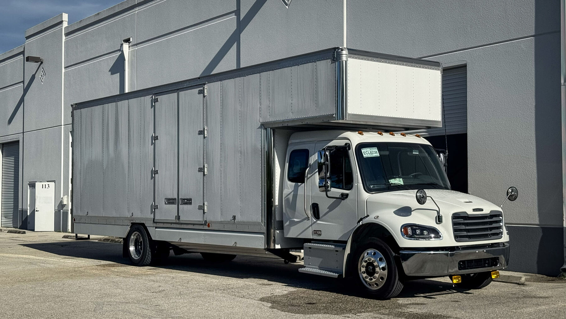 White 26-foot NXT Move box truck before commercial wrap installation by CRD Wraps