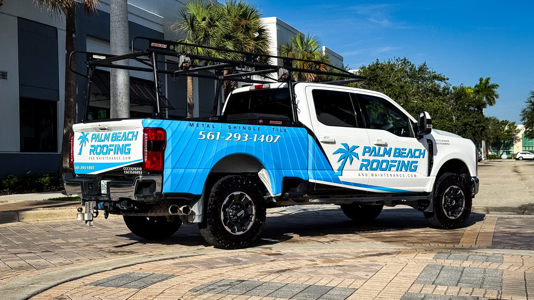 Passenger-side view of the finished Palm Beach Roofing commercial truck wrap